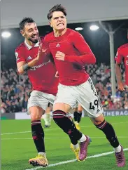  ?? AFP ?? Manchester United's Alejandro Garnacho (R) celebrates after scoring against Fulham at Craven Cottage in London.