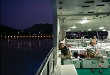  ?? ?? PASSENGERS ARE FEW ON THE LAST FERRY OF THE DAY BETWEEN DOWNTOWN SHANTOU AND THE SUBURBAN HAOJIANG DISTRICT