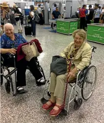  ??  ?? Patsy, left, and Francie were fast-tracked to their aircraft in their wheelchair­s.