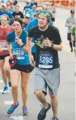  ?? Paul Aiken, Daily Camera ?? Runners struggle up the last hill to Folsom Field during the 2018 Bolder Boulder Citizen’s Race in 2018.