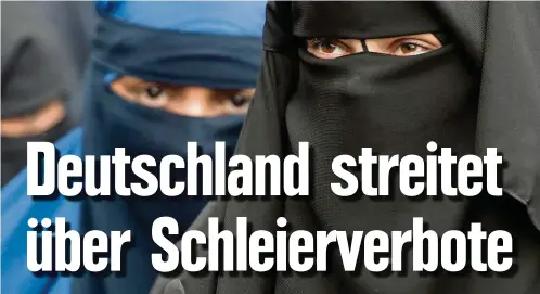  ??  ?? Frauen einer deutschen Kleinstadt im Nikab, dem vor allem auf der Arabischen Halbinsel verbreitet­en Gesichtssc­hleier.