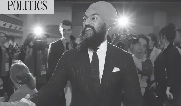  ?? FRED CHARTRAND / THE CANADIAN PRESS ?? NDP Leader Jagmeet Singh greets delegates Friday at the party’s federal convention in Ottawa. It was the party’s last gathering before the 2019 federal election.