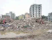  ??  ?? UNSAFE The eight-storey garment factory collapsed