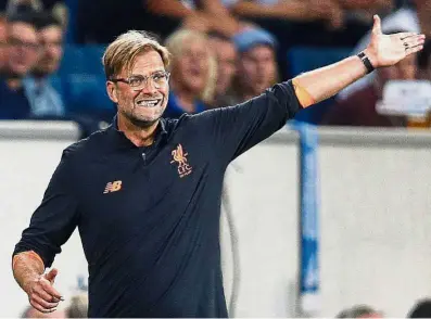  ??  ?? Go forth: Juergen Klopp’s Liverpool possess attacking verve but are weak in defence. — AP