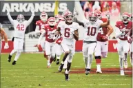  ?? Michael Woods / Associated Press ?? Alabama’s DeVonta Smith (6) returns a punt for a touchdown against Arkansas on Dec. 12.