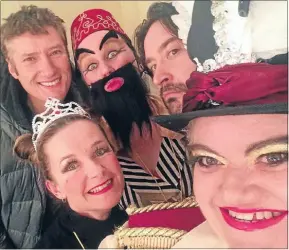  ??  ?? Costumed selfie: Before the performanc­e of their show in Feilding, from left, Rob Ormsby, Nicki Bramwell-Cooke, Tanisha Wardle, Carl Johnstone and Sandy Brewer from Porirua Little Theatre.