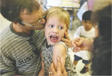  ?? DAVID MCNEW / GETTY IMAGES ?? A single dose of the vaccine is about 93 per cent effective against measles. Two doses starting after 12 months are about 96 to 97 per cent effective.