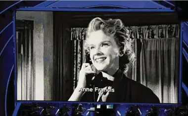  ?? Kevin Winter/TNS ?? A picture of actress Anne Francis is displayed during a homage during the 83rd Annual Academy Awards held at the Kodak Theatre on Feb. 27, 2011, in Hollywood, Calif.