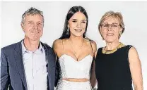  ?? PHOTO: SUPPLIED ?? Leaving a legacy . . . Sophia Crestani with her parents, Bede Crestani and Elspeth McMillan, ahead of her year 13 ball.