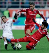  ?? AP ?? Bayern’s Philipp Lahm, Ingolstadt’s Mathew Leckie and Ingolstadt’s Almog Cohen challenge for the ball. —