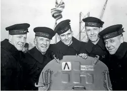  ??  ?? This February 14, 1942 photo provided by the US National Archives shows the five Sullivan brothers on board the USS Juneau at the time of her commission­ing ceremonies at the New York navy yard. They are, from left, Joseph, Francis, Albert, Madison and...