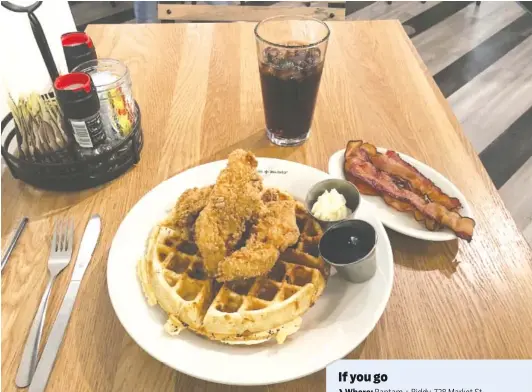  ?? PHOTO BY JIM TANNER ?? The Fried Chicken &amp; Cheddar Waffle at Bantam + Biddy is served with maple syrup and honey butter. Make it a bacon chedddar waffle or add homemade bourbon-pecan syrup for an additional $1.50 each.