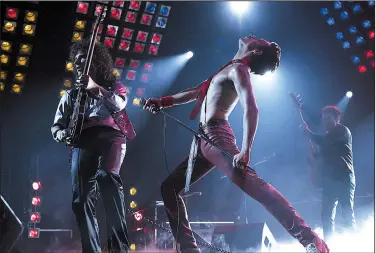  ??  ?? The story of Freddie Mercury, lead singer of the rock group Queen, comes to film with Bohemian Rhapsody starring (from left) Gwilym Lee as Brian May, Rami Malek as Mercury and Joe Mazzello as John Deacon.