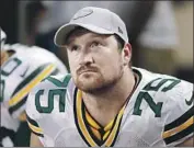  ?? Charles Rex Arbogast Associated Press ?? BRYAN BULAGA reunites with James Campen, who coached him for nine seasons in Green Bay.