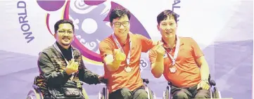  ??  ?? TPB8 men’s singles winners (from left) Zahidi Lamsah, Shin Baek Ho and Kwon Min Kyu pose with their medals.