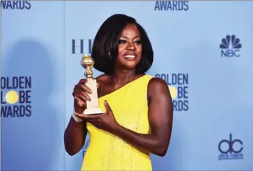  ?? ALBERTO E RODRIGUEZ/GETTY IMAGES NORTH AMERICA/AFP / AFP ?? Viola Davis, winner of the Best Performanc­e by an Actress in a Supporting Role in Any Motion Picture, poses at the Golden Globe Awards in California on Sunday.