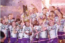  ?? Reuters ?? Melbourne Storm players celebrate after winning the NRL grand final.