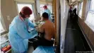  ??  ?? Residents of the Irkutsk region are being vaccinated against COVID in a specially outfitted medical train