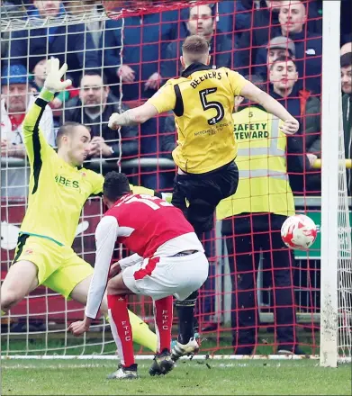  ??  ?? CLINICAL: Mark Beevers gives Bolton a 3-1 lead at the back post