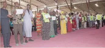  ?? ?? Testifiers queue to share their testimonie­s at the programme titled: “From Sorrow To Joy,” held recently at the headquarte­rs of The Lord’s Chosen Charismati­c Revival Ministries in Ijesha, Lagos