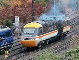  ?? Dave Gilbert ?? Back on the main line for the first time since completion of its repaint, 43049 Hill departs from its former home depot en route light engine for LSL Crewe on November 10.
Neville