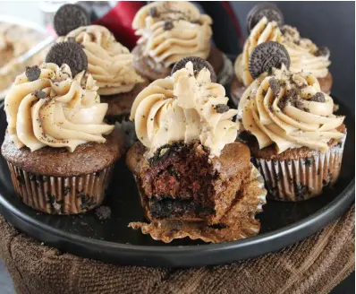  ??  ?? Take a sweet bite of this chocolate Oreo cupcake.