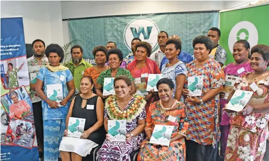  ??  ?? Minister for Women, Children and Poverty Alleviatio­n Mereseini Vuniwaqa (sitting second from left) with partners and stakeholde­rs of the Women in Fisheries Network during the launch of the Rapid Care Analysis Report in Suva yesterday.