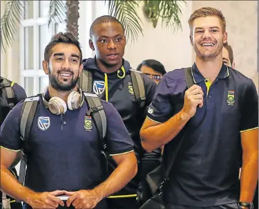  ?? Picture: WERNER HILLS ?? IN THE BAY: Proteas, from left, Tabraiz Shamsi, Kagiso Rabada and Aiden Markram arrive in Port Elizabeth