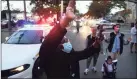  ?? Arnold Gold / Hearst Connecticu­t Media ?? A police officer directs traffic as the anti-violence march stops on Grand Avenue.