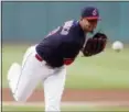  ?? TONY DEJAK — ASSOCIATED PRESS ?? Carlos Carrasco delivers during the first inning against the Twins. Carrasco struck out 11, and the Indians won, 8-1.