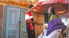  ?? ?? Dilshat Tursun and his wife, Hadiya Msham Abulla, prepare to bring their son home in Kashgar, northwest China’s Xinjiang Uygur Autonomous Region.