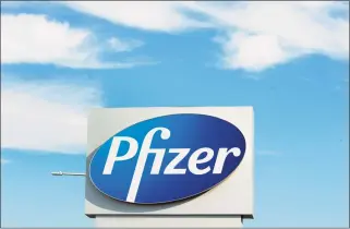  ?? Ryan Remiorz / Associated Press ?? A sign with the Pfizer logo stands outside the corporate headquarte­rs of Pfizer Canada in Montreal, in 2020.