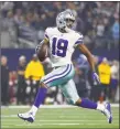  ?? Ron Jenkins / Associated Press ?? Cowboys wide receiver Amari Cooper runs in for a touchdown against the Redskins during the second half of Thursday’s game.