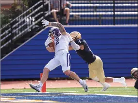  ?? TIM PHILLIS — FOR THE NEWS-HERALD ?? Mount Union’s Josh Petruccell­i (Perry) scores on a 27-yard catch and run during his team’s 37-14 win over John Carroll in 2019.