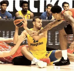  ?? ( Sefi Magriso/ Maccabi Tel Aviv) ?? MACCABI TEL AVIV needs more production from center Ante Zizic ( with ball), beginning with tonight’s Euroleague duel with Khimki Moscow in Russia.