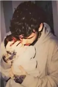  ??  ?? Father: Liam Payne with son, baby Bear