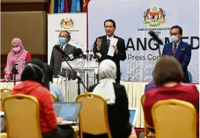  ?? — Bernama ?? Updating statistics: Dr Noor Hisham speaking during a press conference on Covid-19 at the Health Ministry in Putrajaya.