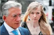  ?? KIRSTY WIGGLESWOR­TH/AP PHOTO ?? Connie Yates, mother of critically ill baby Charlie Gard, arrives at the Royal Court of Justice in London on Wednesday. A British judge is set to rule on where Charlie Gard, who has a rare genetic disease, will spend the last days of his life. A High Court judge will decide whether his parents’ wish to take him home to die will be granted.