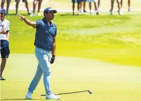  ?? EMIL LIPPE AP ?? Colombia’s Sebastian Muñoz signals the direction of his shot on No. 18 during the first round of the AT&T Byron Nelson. It was one of few wayward shots in his round of 60.