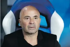 ?? THE ASSOCIATED PRESS ?? Argentina coach Jorge Sampaoli says he begs the team’s 40 million fans for forgivenes­s following a crushing 3-0 loss to Croatia in group stage play on Thursday.