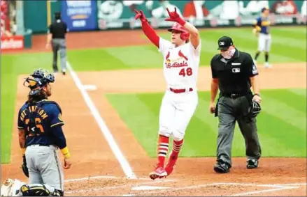  ?? AFP ?? Harrison Bader celebrates after hitting a home run against the Brewers to put the St Louis Cardinals in the postseason.