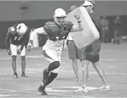  ??  ?? Cardinals receiver Larry Fitzgerald works during training camp at State Farm Stadium in Glendale on Wednesday.