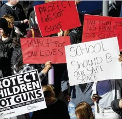  ?? DAVID ZALUBOWSKI/AP ?? Students from East High and West High call for gun control measures Thursday at a rally outside the Colorado Capitol in Denver. A shooting injured two administra­tors at East High on Wednesday.