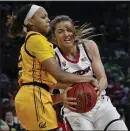  ?? JOHN LOCHER — ASSOCIATED PRESS ?? Cal’s Cailyn Crocker, left, and Arizona’s Helena Pueyo (13) battle for the ball during Friday’s Pac-12 tournament game.