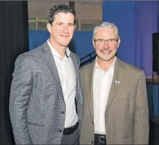  ?? ACADIA ATHLETICS ?? Paul Mcfarland, left, with Acadia athletics director Kevin Dickie.