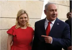  ?? (Reuters) ?? PRIME MINISTER Benjamin Netanyahu and his wife, Sara: ‘I do not think LGBTQs are not equal,’ she said.