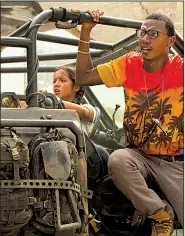  ??  ?? Feisty Izabella (Isabela Moner) and comic relief Jimmy (Jerrod Carmichael) are attacked by Megatron’s minions in Transforme­rs: The Last Knight, the fifth and (allegedly) last movie in the series that will be directed by Michael Bay.