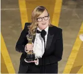  ?? CHRIS PIZZELLO INVISION ?? Sarah Polley accepts the award for best adapted screenplay for “Women Talking” at the Oscars on Sundays.