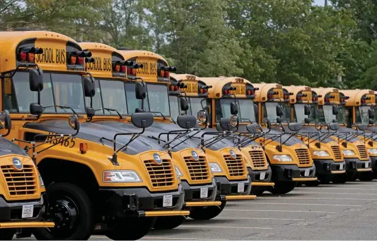  ?? MATT sTONE / hErAld sTAff filE, ABOvE, NANcy lANE / hErAld sTAff filE, TOp ?? BACK TO NORMAL: Gov. Charlie Baker says school statewide in the fall should be much like it was before the pandemic.