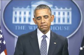  ?? Martinez Monsivais/Associated Press ?? President Barack Obama pauses Wednesday during his final presidenti­al news conference in the briefing room of the White House in Washington.